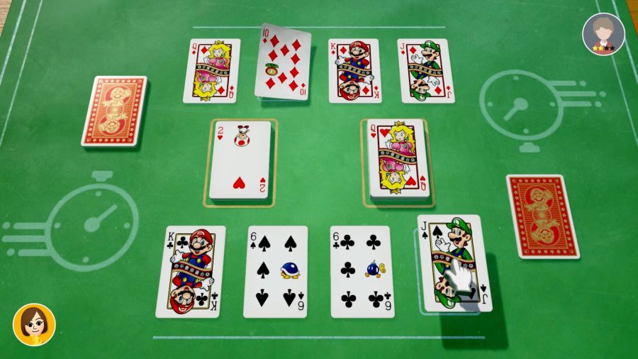 カードのゲームがプレイされており、マリオのキャラクターがカード自体に表示されています 