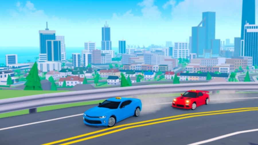 高層ビルを背景に、赤い車と青い車が通りを漂っています。