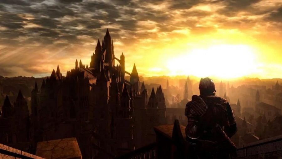 ダークソウルのキャラクターは、アノールロンド、遠くの日光、建物の巨大な尖塔を見渡しています。