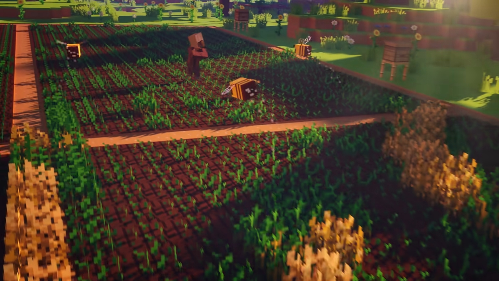 最高の農場ゲーム - Minecraft。 スクリーンショットには、ミツバチが上空を飛び回り、その中に村人が立っている一続きの農地が示されています。