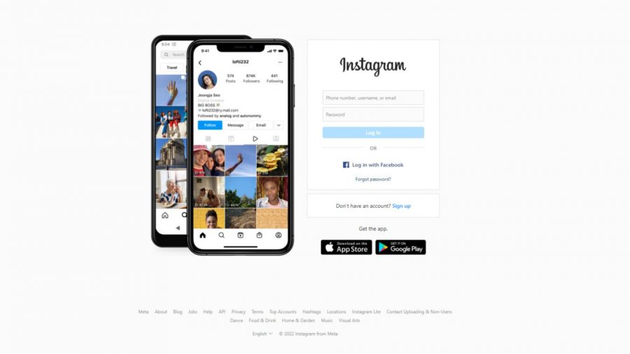 Instagram のダウンロード - アプリがインストールされたスマートフォンを表示する Instagram のホーム ページ