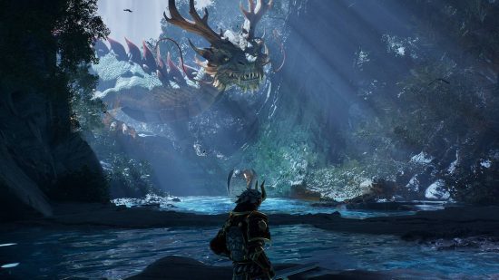 Fortnite Creative 2.0 コード: スクリーンショットは、ドラゴンのいる大きな洞窟にいる Fortnite のキャラクターを示しています