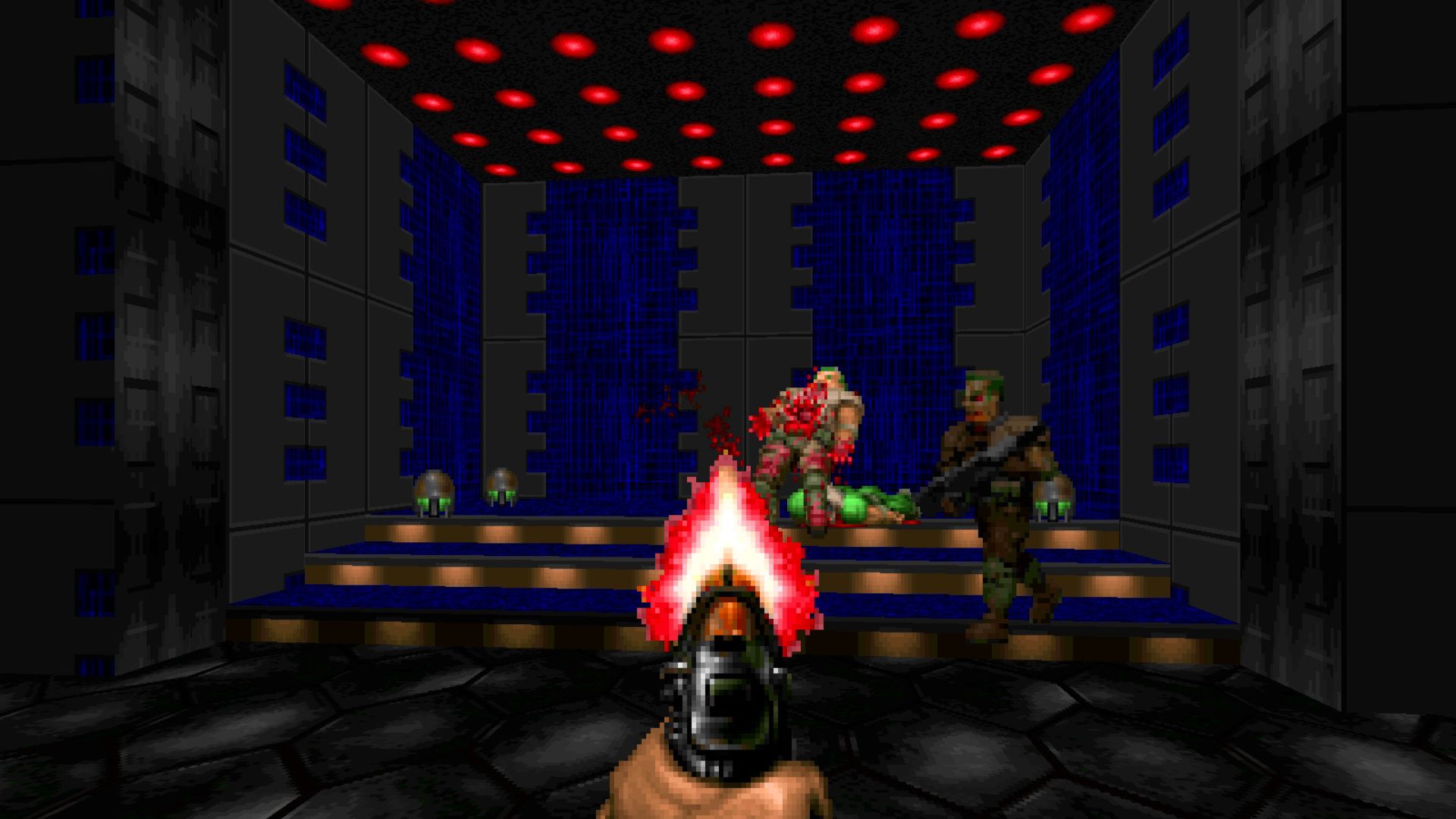 FPS ゲーム - 屋根に赤いライトがあり、ピクセル化された悪魔が彼の前で死んでいる部屋で銃を構えている男性の一人称ショット。