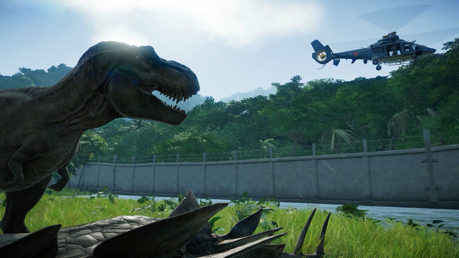 Jurassic World games - T-レックスが草むらの端にあるフェンスの上、うっそうとしたジャングルの中からヘリコプターを見ています。