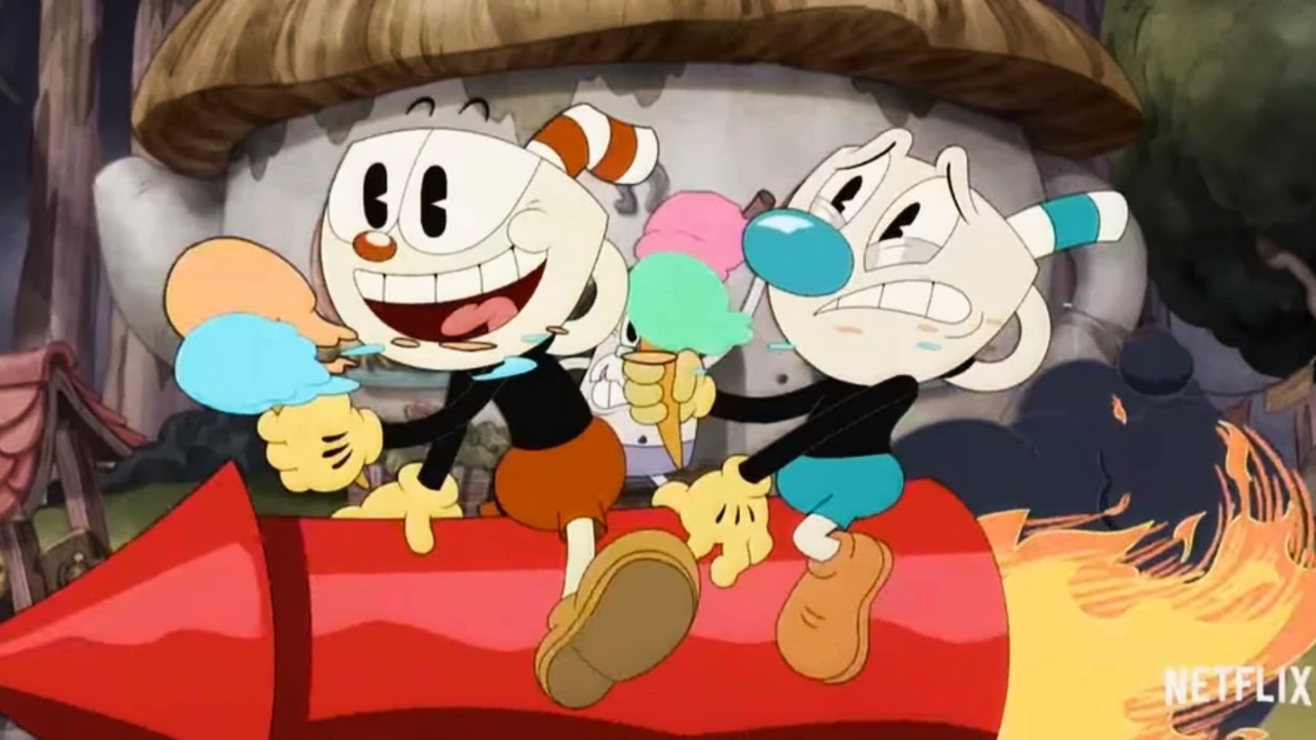 Netflix ダウンロード - 動くロケットの上でアイスクリームを食べるカップヘッドとマグマン