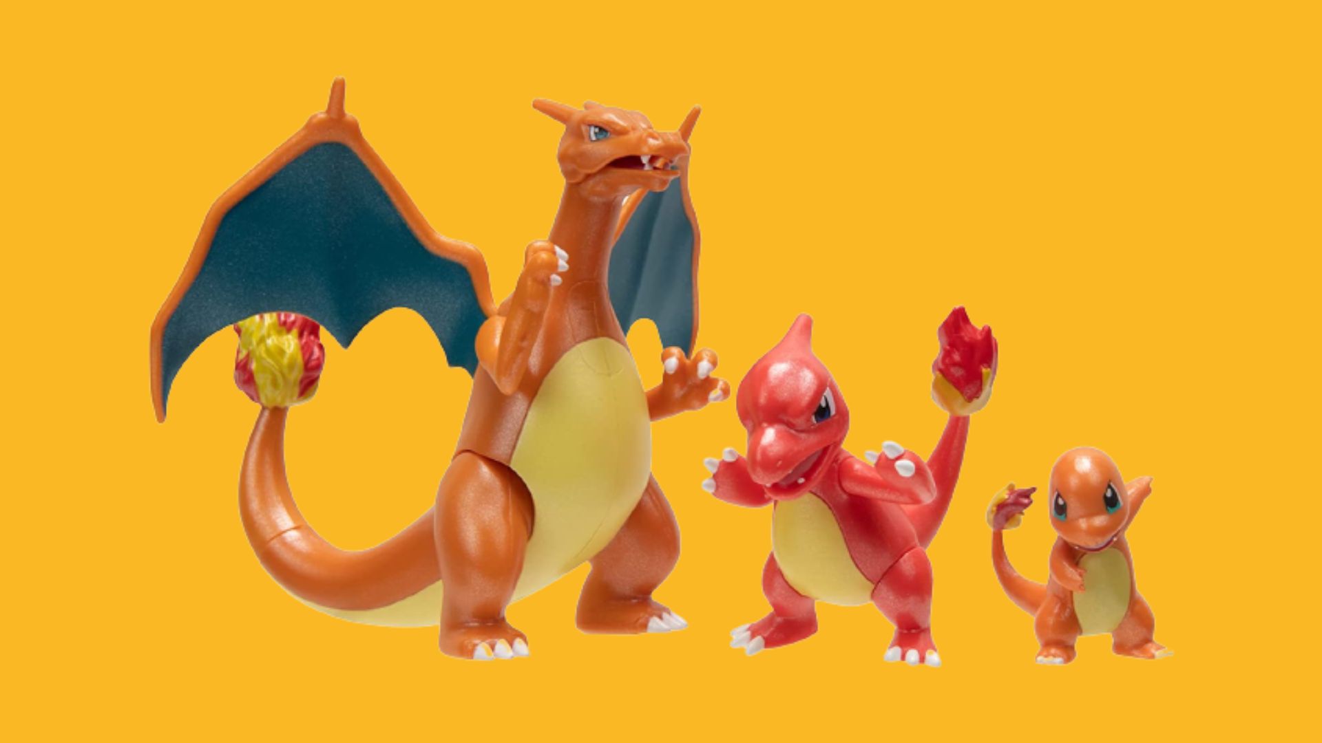 ポケモンのフィギュア: オレンジ色の背景にヒトカゲ、リザードン、カメレオン、ドラゴンのプラスチック製の反対側のおもちゃのバージョン。