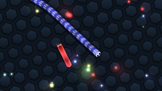 io ゲーム: 軽いペレットに向かって滑り降りる 2 匹のワームを示す Slither.io のスクリーンショット 