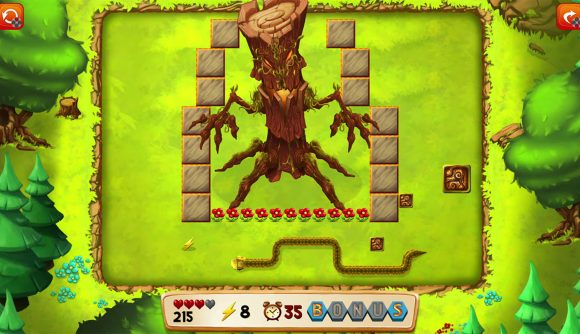 Switch で「Snake - Classic Snake Adventures」をプレイする、木のボスをすり抜けていくヘビを示すスクリーンショット
