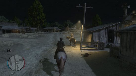 Dead Redemption Switch のレビューを読んでください。ランプの光で馬に乗っている男性が馬に乗っている女性を照らしている様子を示しています。 夜になり、彼らは小さな建物の隣にある未舗装のトラックを走りました。