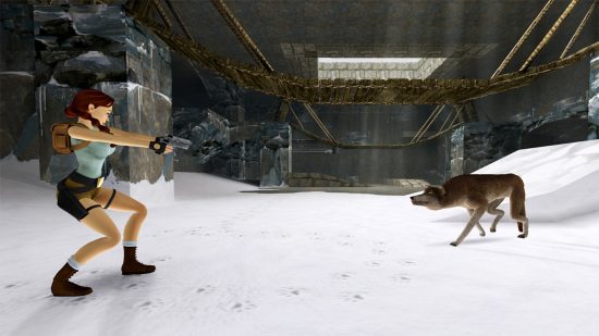 雪の墓の中でオオカミに銃を向けるララ・クロフト